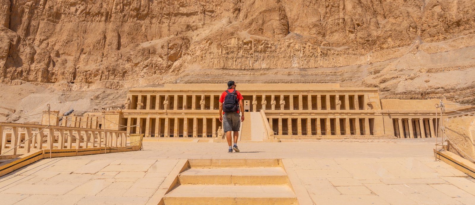 A person visiting the Mortuary Temple of Hatshepsut in Egypt