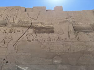 Medinet Habu relief of Ramesses III’s victory over the Libyans showing officials tallying piles of severed enemy hands and phalli and lines of captured Libyans