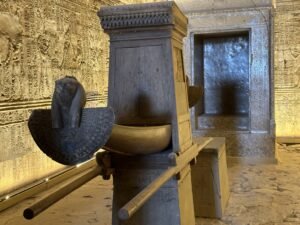 Replica sacred barque with a falcon figure inside the sanctuary of the Temple of Horus at Edfu, Egypt