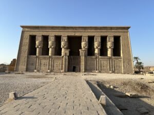 Front facade of the Temple of Hathor at Dendera, Egypt, with six Hathor-headed columns