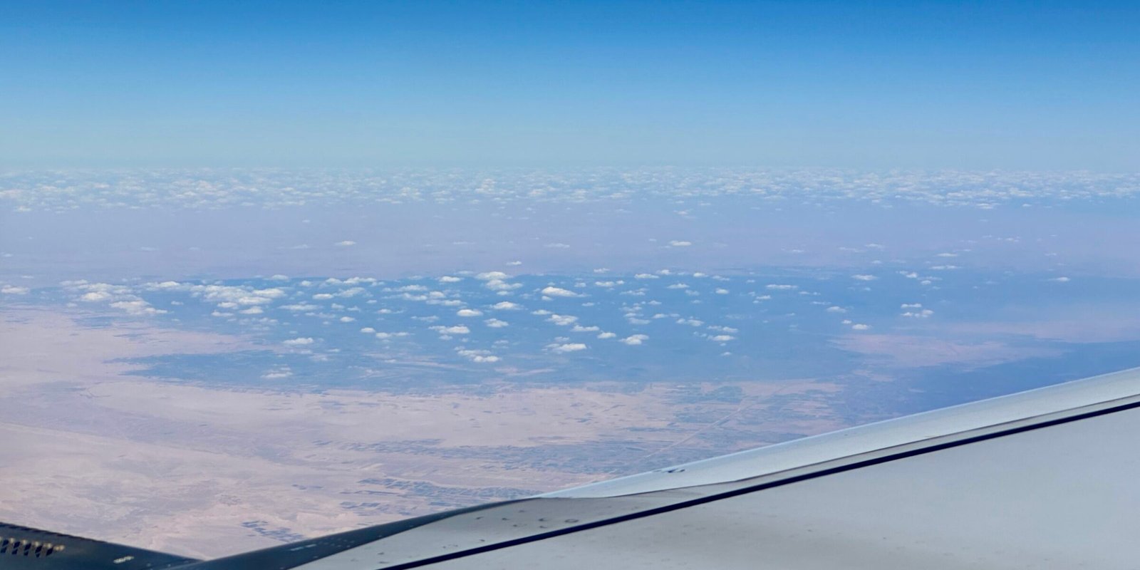 Aerial view of desert terrain in Egypt, used as contextual imagery for the report on the early Coptic settlement at Kharga Oasis