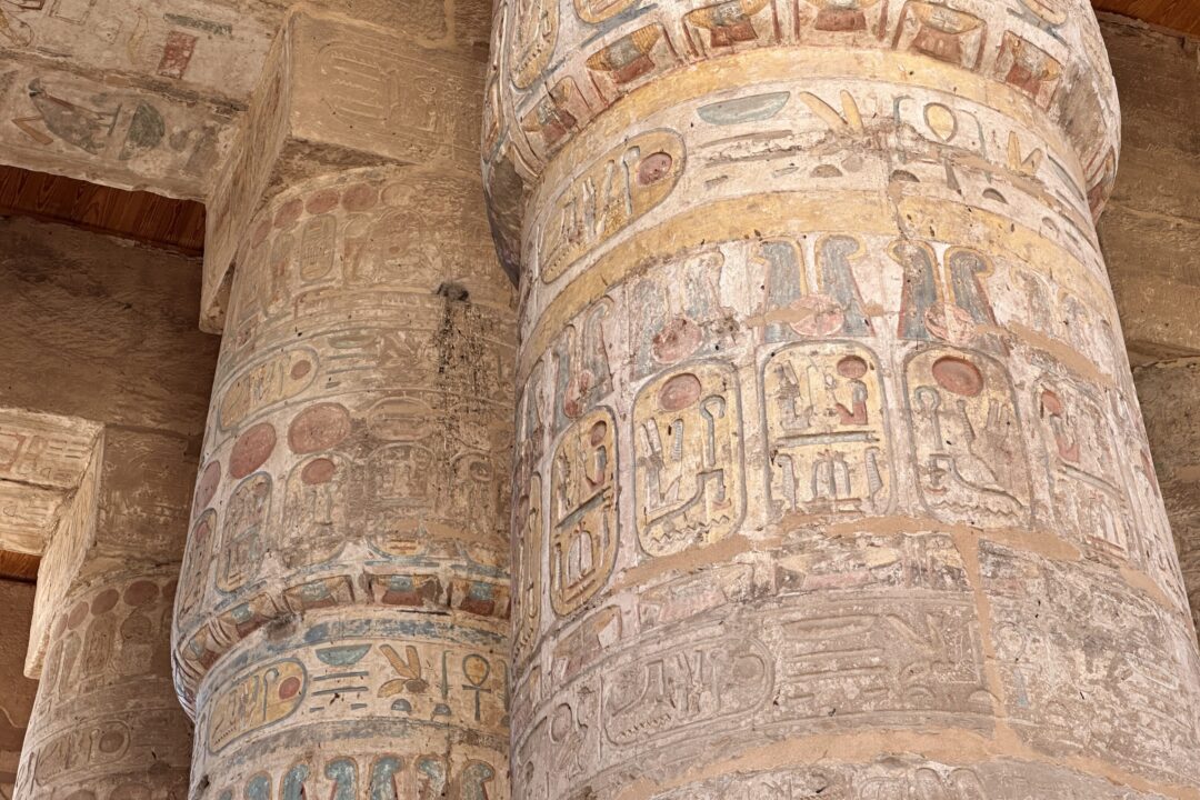 Painted columns in the Great Hypostyle Hall at Karnak Temple in Luxor, Egypt