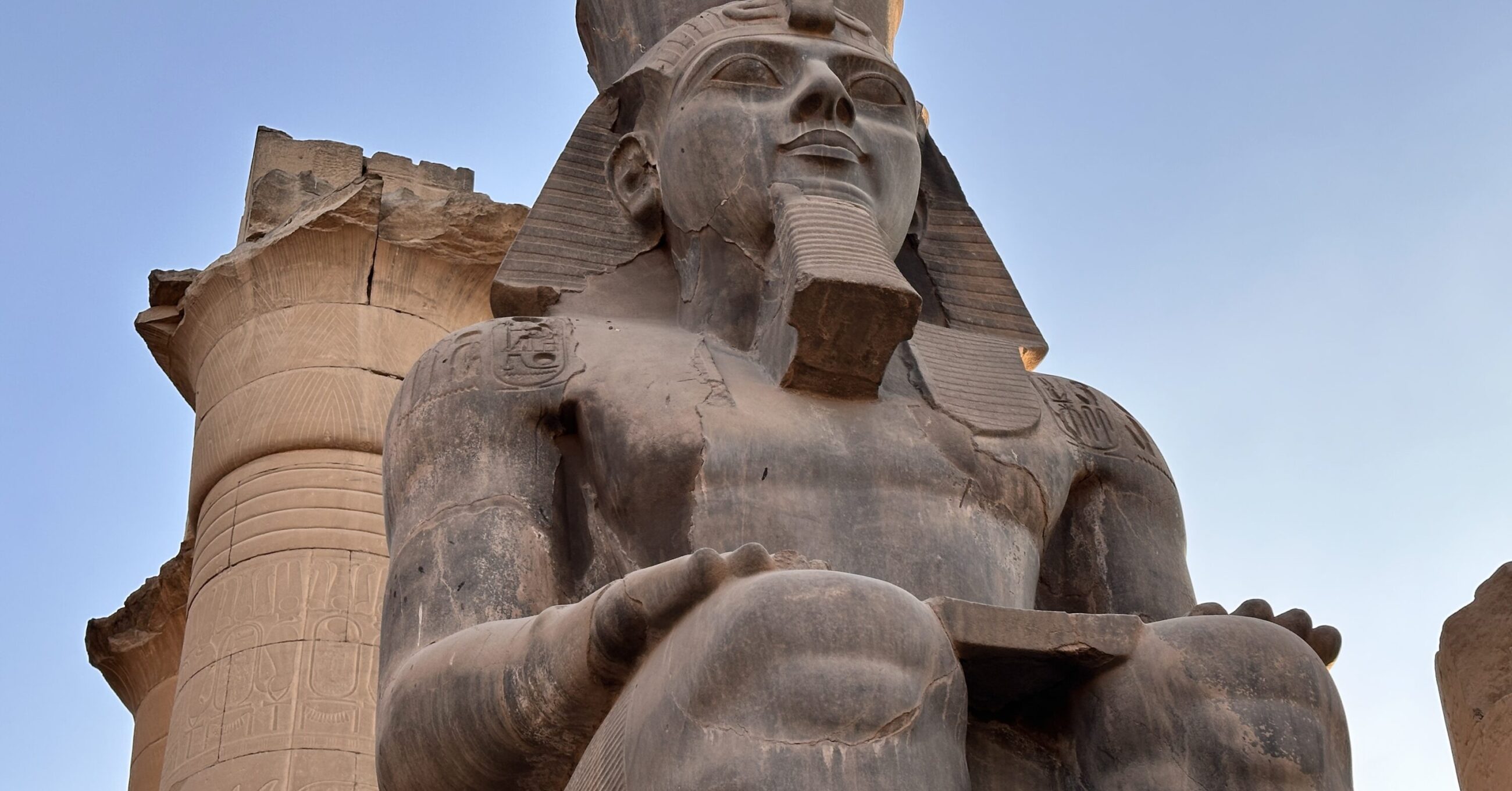 Colossal Ramesses II statue at Luxor Temple, contextual photograph for newly discovered royal sculpture fragments in the Nile Delta