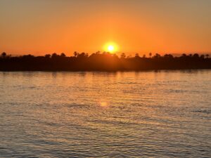 Warm sunrise light over the Nile River in Egypt