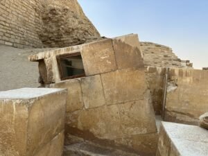 Stone serdab chamber with viewing opening beside the Step Pyramid of Djoser at Saqqara