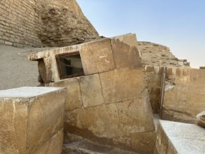 Stone serdab chamber with viewing opening beside the Step Pyramid of Djoser at Saqqara
