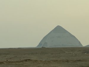 Bent Pyramid of Sneferu viewed from a distance across the flat desert at Dahshur