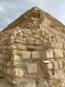 Close view of rough limestone blocks forming a corner of the Step Pyramid of Djoser at Saqqara