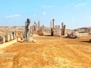 Weathered stone statues, columns, and carved blocks at the archaeological site of Tanis in Egypt’s eastern Nile Delta