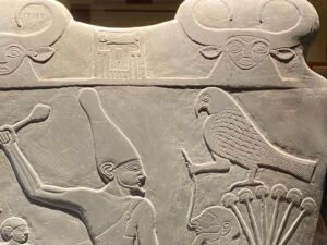 Horus falcon and King Narmer smiting an enemy on the Narmer Palette, 1st Dynasty, displayed in the Egyptian Museum in Cairo