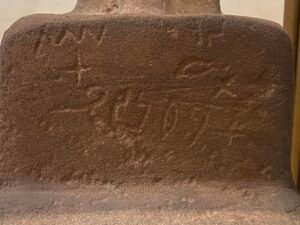Close-up of the worn hieroglyphic inscription naming Hetep and recording titles and offering text on his 12th-Dynasty granite block statue, JE 48858, Egyptian Museum in Cairo