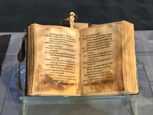 Open pages of the late 4th- to early 5th-century Mudil Psalter, the oldest complete Coptic Psalter, at the Coptic Museum in Cairo