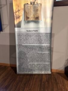 Coptic Museum information panel explaining the Mudil Psalter, its 1984 discovery near Beni Suef and restoration of the oldest complete Coptic Psalter