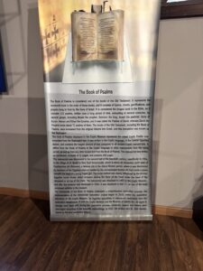Coptic Museum information panel explaining the Mudil Psalter, its 1984 discovery near Beni Suef and restoration of the oldest complete Coptic Psalter