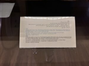 Coptic Museum label for object 3349, a 13th-century Passion triptych with Crucifixion, Last Supper and Harrowing of Hell scenes