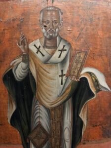 19th-century Greek icon of Saint Nicholas, Bishop of Myra, holding a decorated Gospel book at the Coptic Museum in Cairo