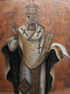19th-century Greek icon of Saint Nicholas, Bishop of Myra, holding a decorated Gospel book at the Coptic Museum in Cairo