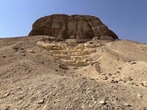 Eroded mudbrick core of the Pyramid of Senusret II rising above the desert at Lahun, Egypt