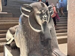 Granite sphinx of King Amenemhat III from Tanis, one of the paired GEM 1380/1381 sphinxes displayed at the Grand Egyptian Museum in Giza