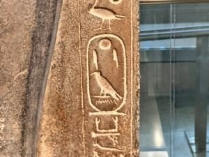 Close-up of King Merenptah’s Ba-en-Re Mery-Amun throne-name cartouche on his granite standard-bearer statue, GEM 2234, Grand Egyptian Museum