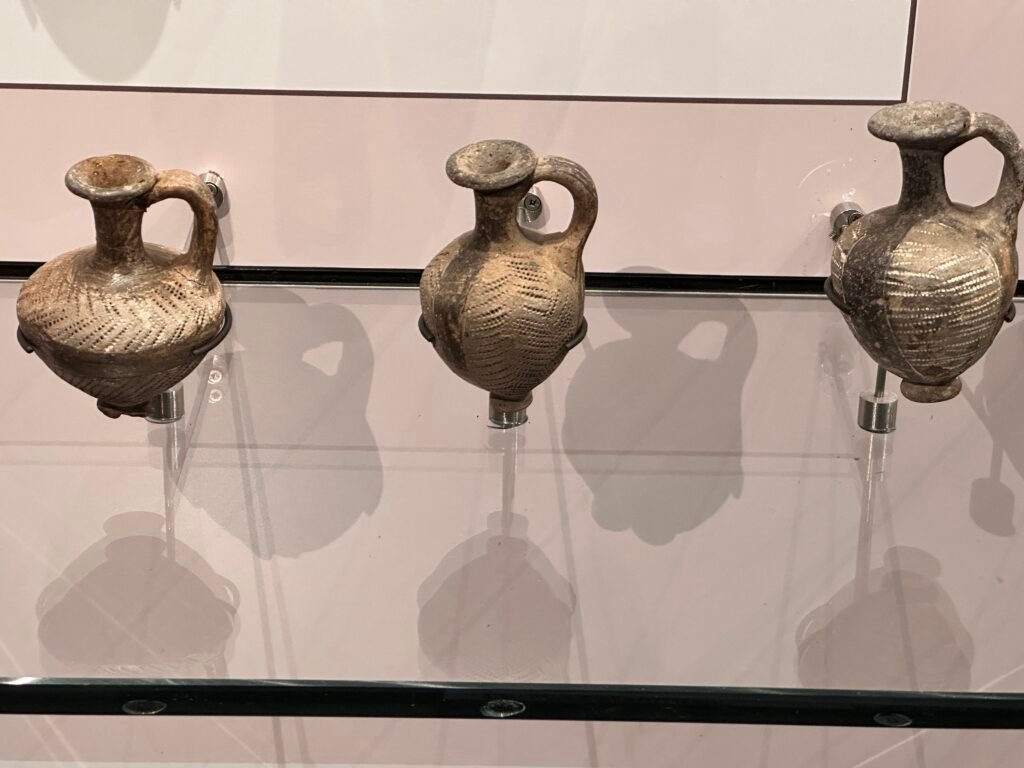 Three Dynasty 13–Second Intermediate Period Tell el-Yahudiya Ware juglets from Avaris (Tell el-Dab'a) with distinctive punctured geometric decoration, Grand Egyptian Museum in Giza