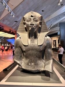 Granite head and upper body of Pharaoh Amenhotep II, GEM 3796, from Karnak and displayed at the Grand Egyptian Museum in Giza