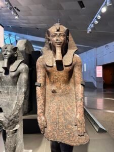 Standing granite statue of Pharaoh Amenhotep II, GEM 3796, from Karnak and displayed at the Grand Egyptian Museum in Giza
