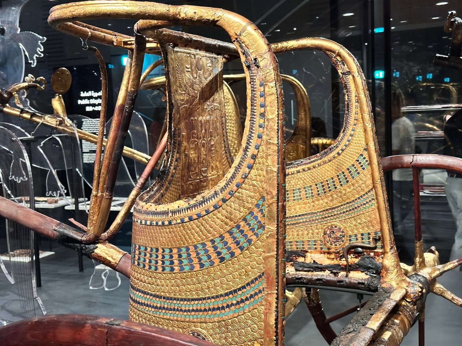 Gilded second state chariot of Tutankhamun, GEM 4940 / JE 61990 / Carter 122, from tomb KV62, with decorated body and six-spoked wheel at the Grand Egyptian Museum
