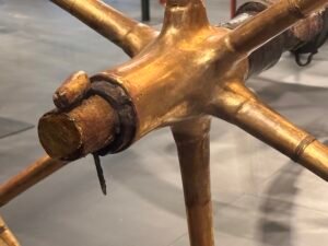 Axle fitting, linchpin and gilded six-spoke hub of Tutankhamun’s ceremonial chariot, JE 61990A and Carter 122, from KV62 at the Grand Egyptian Museum