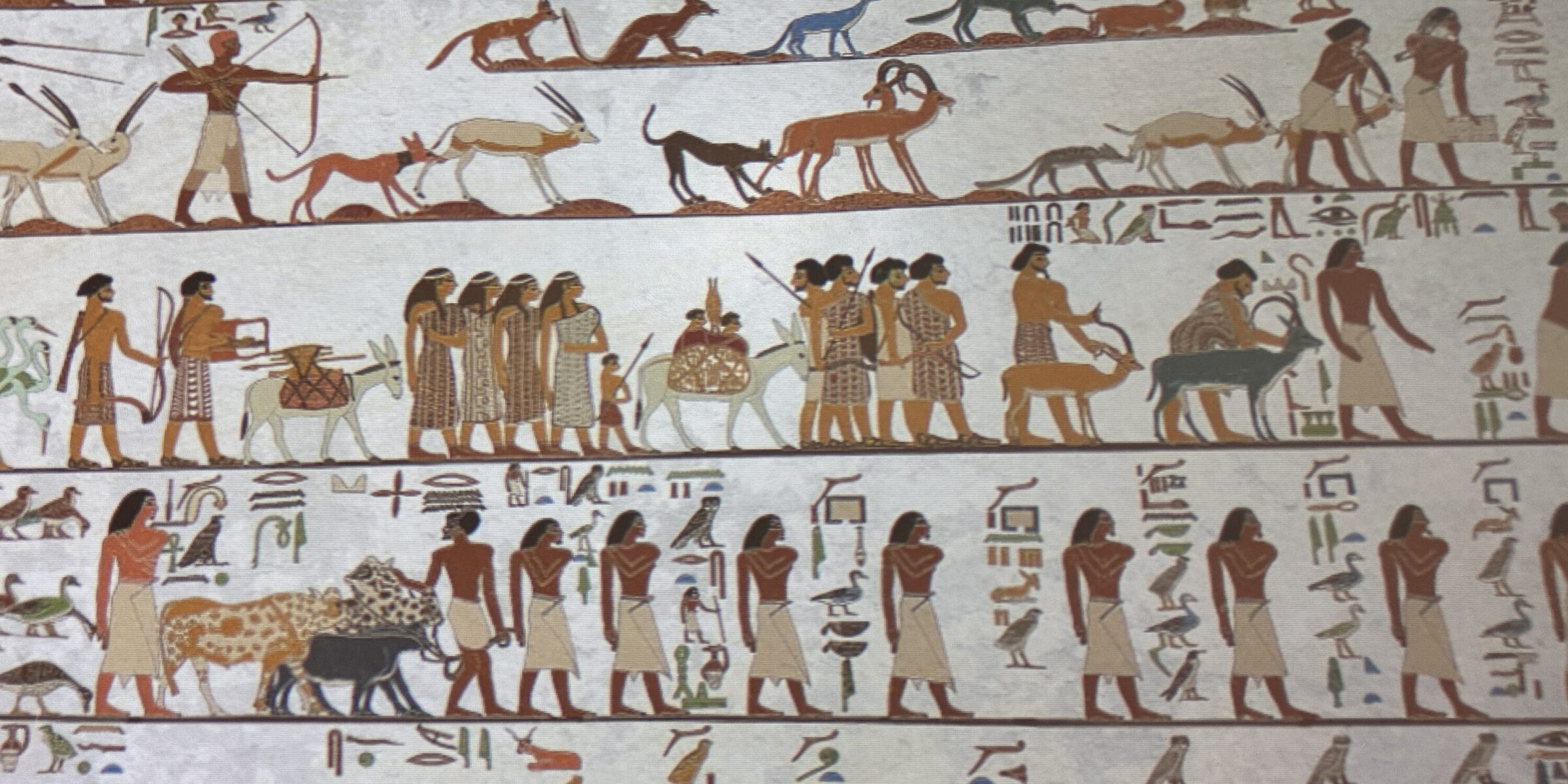 Aamu procession from the 12th-Dynasty tomb of Khnumhotep II at Beni Hasan, shown in a Grand Egyptian Museum reproduction