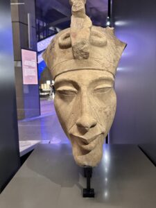Colossal limestone statue head of Pharaoh Akhenaten, GEM 2220, from the Aten Temple at Karnak and displayed at the Grand Egyptian Museum in Giza