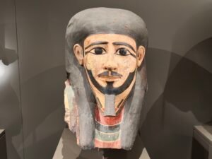 Painted cartonnage mummy mask of Mesehti, GEM 39209, an 11th Dynasty governor of Asyut, displayed at the Grand Egyptian Museum in Giza