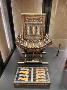 Ceremonial throne of Tutankhamun, JE 62030, with spotted animal-skin seat, gilded inlay and the winged vulture goddess Nekhbet on the back, Grand Egyptian Museum in Giza
