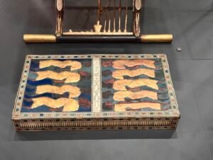 Nine Bows footstool of Tutankhamun, JE 62045, inlaid with bound African and Asiatic prisoners symbolically placed beneath the king's feet, Grand Egyptian Museum in Giza