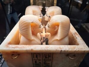 Travertine canopic chest of Tutankhamun, GEM 10, with four royal-head stoppers for the king's internal organs, displayed at the Grand Egyptian Museum in Giza