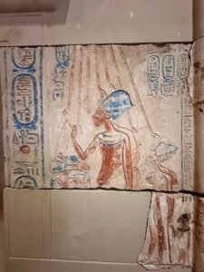 Painted limestone relief JE 65041 showing Pharaoh Akhenaten in the blue crown and Queen Nefertiti making offerings beneath the hand-ended rays of the Aten, Egyptian Museum in Cairo