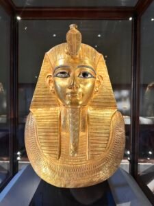 Gold funerary mask of Pharaoh Psusennes I, JE 85913, with nemes headdress, uraeus, plaited false beard and broad collar, Egyptian Museum in Cairo