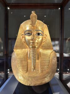 Gold funerary mask of Pharaoh Psusennes I, JE 85913, with nemes headdress, uraeus, plaited false beard and broad collar, Egyptian Museum in Cairo