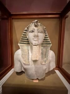 Painted marble bust of Pharaoh Thutmose III, JE 90237, with striped nemes headdress, black-lined eyes and ceremonial beard, Egyptian Museum in Cairo