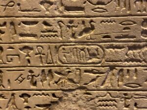 Close-up of King Kamose's royal cartouche and surrounding hieroglyphic lines on the Second Stela of Kamose, Luxor Museum J.43
