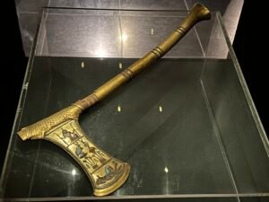 Ceremonial axe of Pharaoh Ahmose I, JE 4673 / CG 52645, with gilded wooden handle and decorated copper blade from Queen Ahhotep's burial at Dra Abu el-Naga, displayed at Luxor Museum
