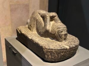 Black granite votive statue of the official Mayi offering a crocodile figure to the god Sobek, Luxor Museum J.135, from the Sobek temple at Dahamsha near Armant