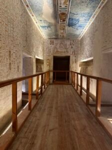 Star-painted blue ceiling and hieroglyph-covered walls inside KV2, the Tomb of Ramesses IV, in the Valley of the Kings near Luxor