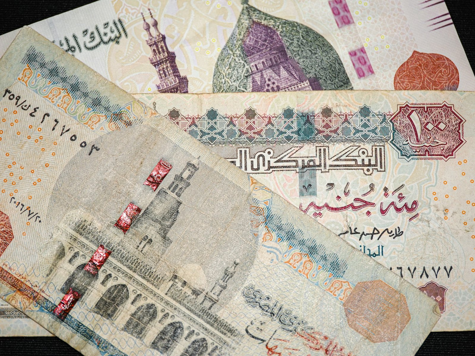 Close view of Egyptian pound banknotes showing Egyptian currency used for everyday cash payments and tipping
