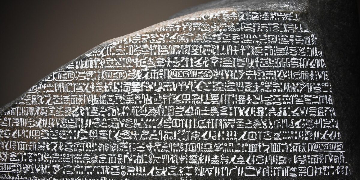 Rosetta Stone showing hieroglyphic, Demotic and Greek inscriptions