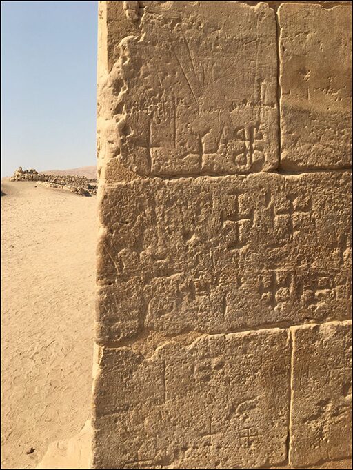 Coptic graffiti cut into the east wall of the Hathor Temple at Deir el-Medina